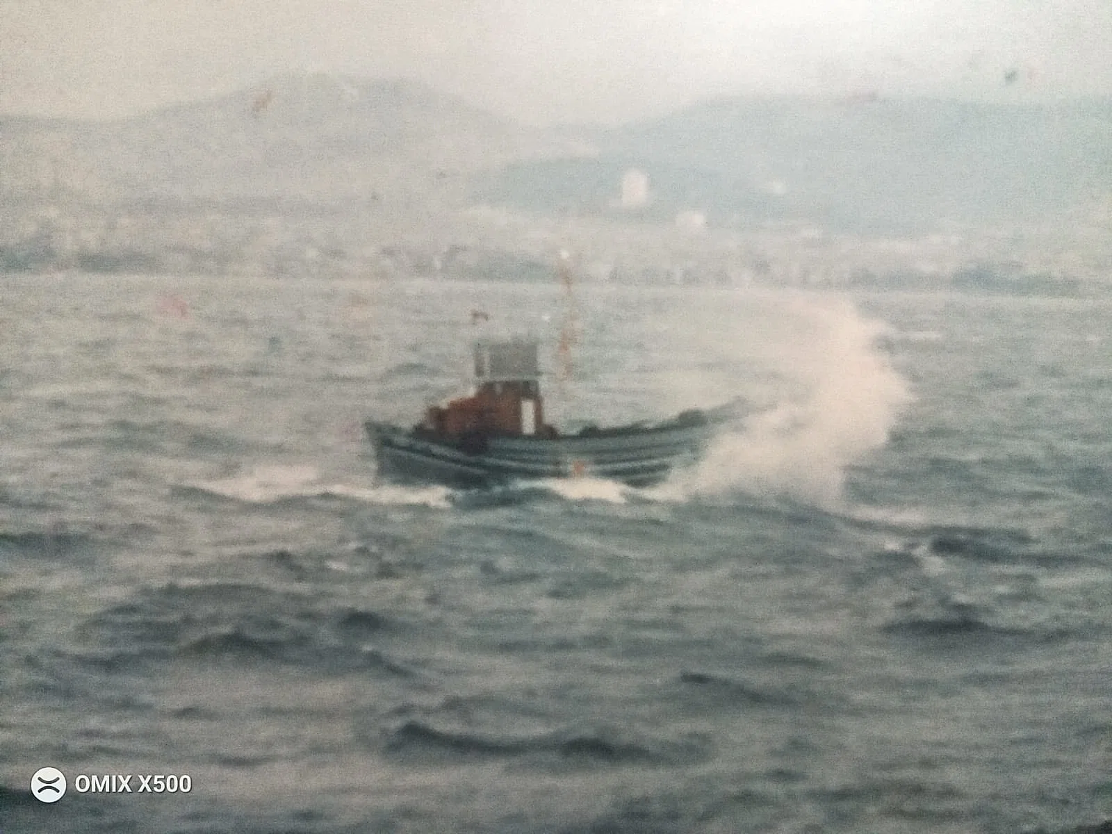 A tugboat sailing in the water