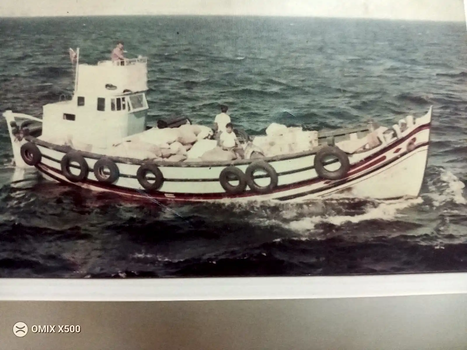 A tugboat sailing in the water